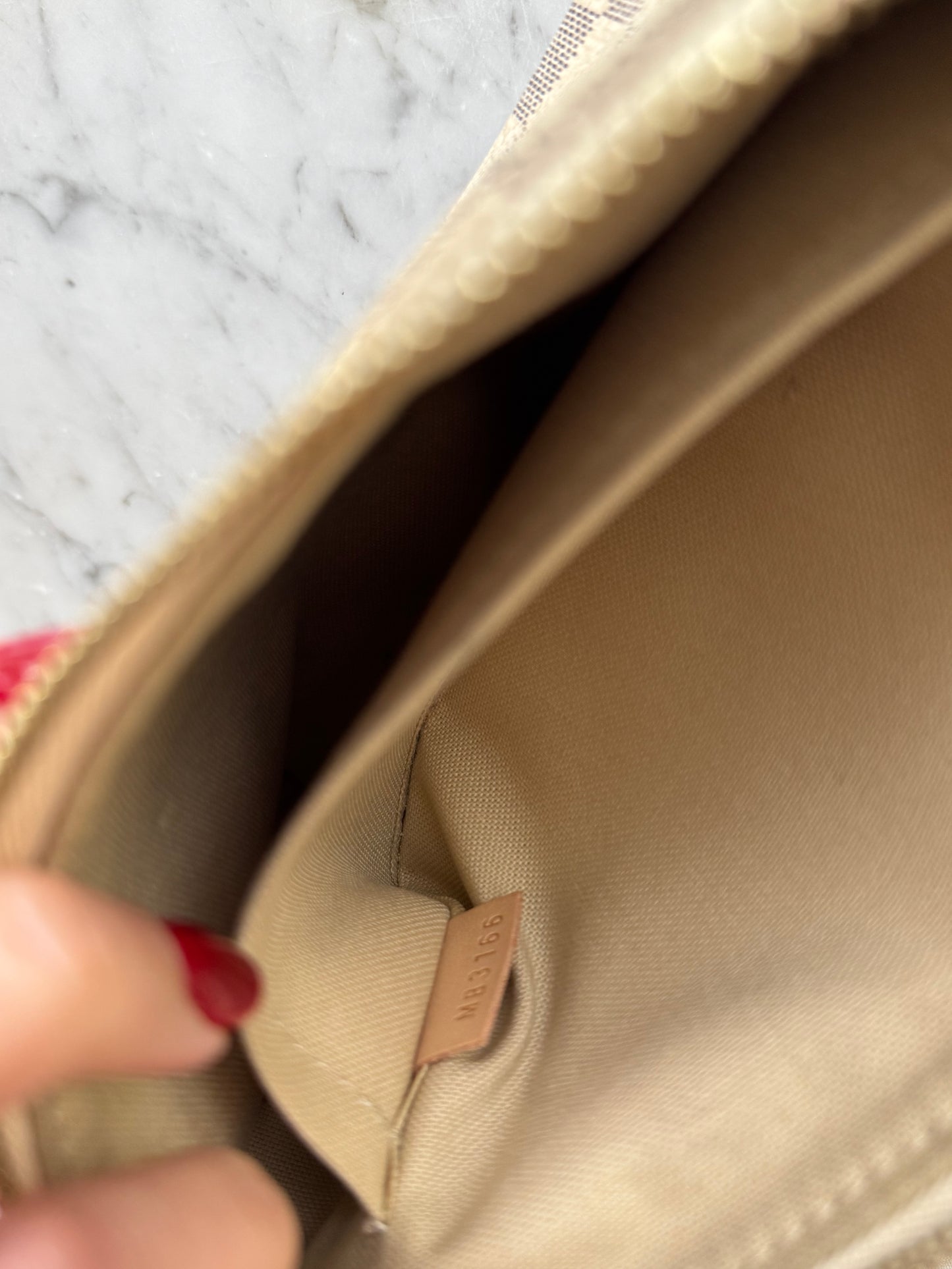 Pochette accessoires Luois vuitton