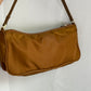 Prada Nylon color cioccolato/senape scuro.