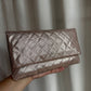 Timeless Chanel Pochette gold rose.