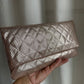 Timeless Chanel Pochette gold rose.