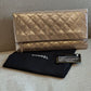 Timeless Chanel Pochette gold rose.