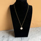 Collana con bottone Chanel