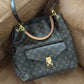 Louis Vuitton Metis hobo.
Monogram