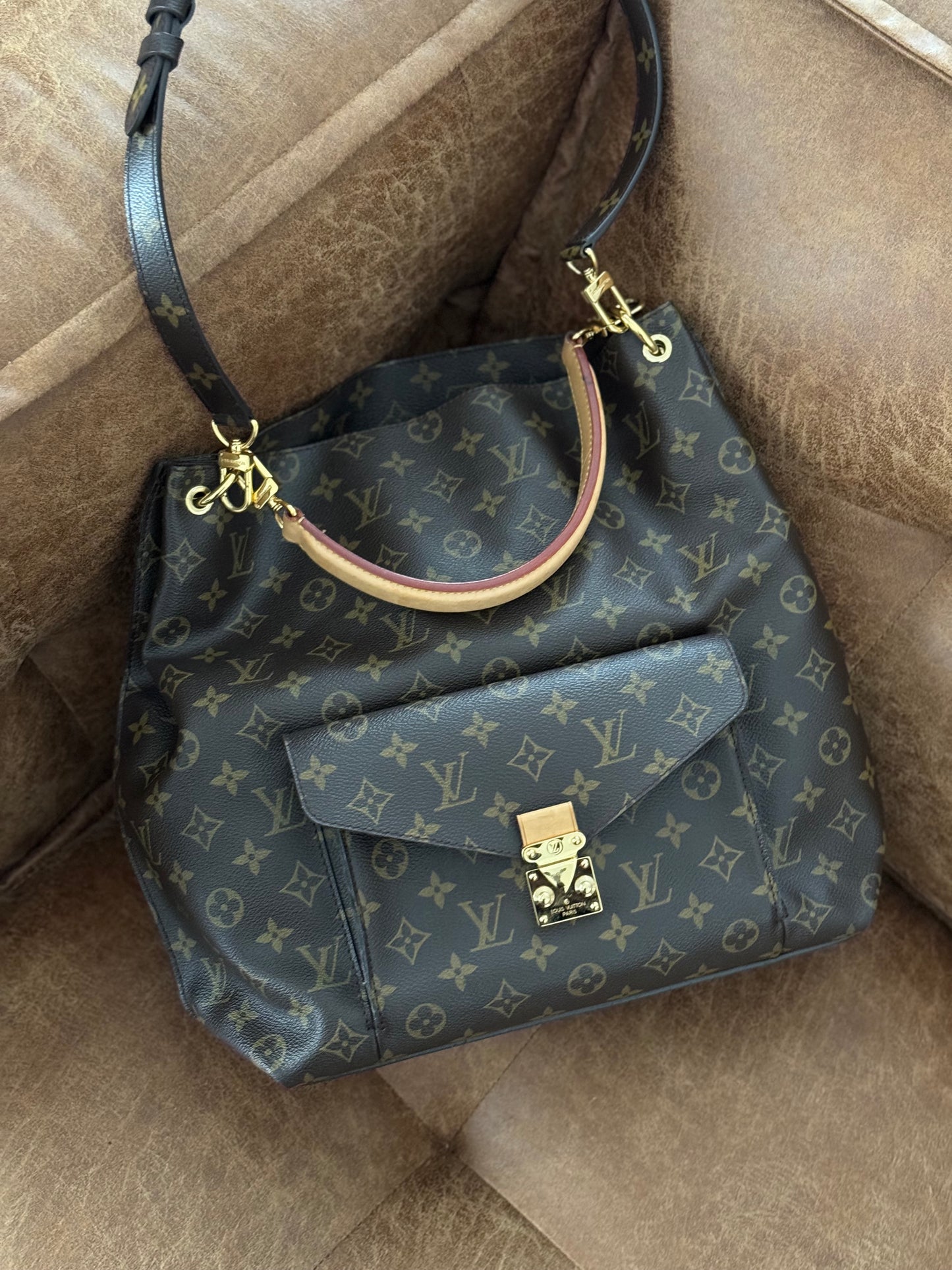 Louis Vuitton Metis hobo.
Monogram