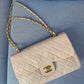 Chanel media in agnello beige.
Misura 25 cm