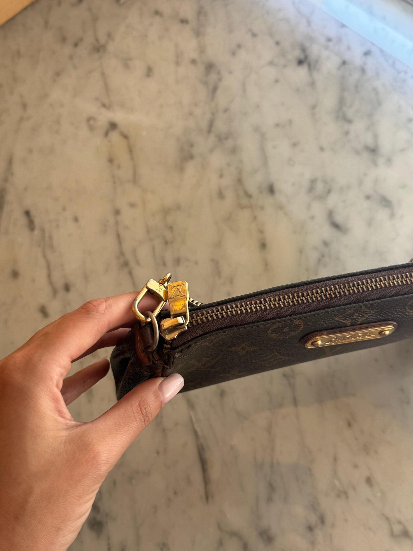 Pochette Eva Louis Vuitton