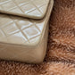 Chanel in pelle beige.