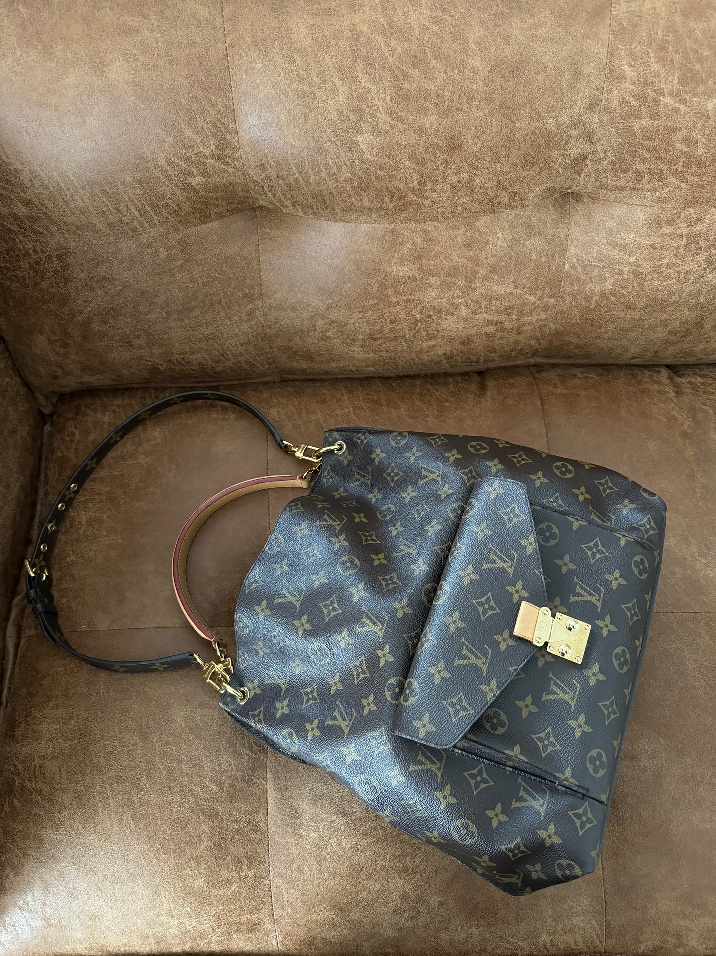 Louis Vuitton Metis hobo.
Monogram