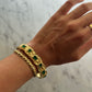 Bracciale rigido vintage con pietre verdi