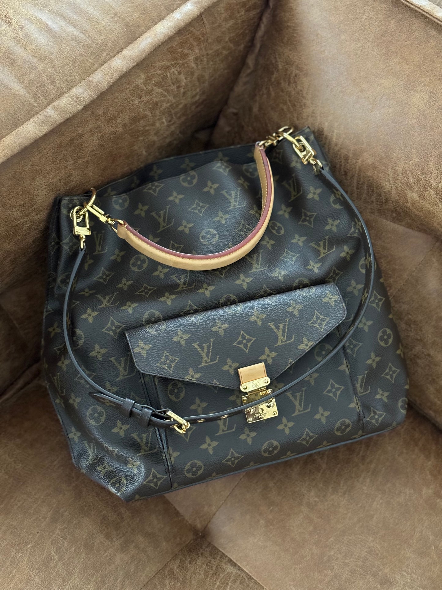 Louis Vuitton Metis hobo.
Monogram