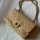 Chanel media in agnello beige.
Misura 25 cm