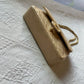 Chanel media in agnello beige.
Misura 25 cm