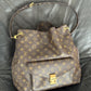 Louis Vuitton Metis hobo.
Monogram