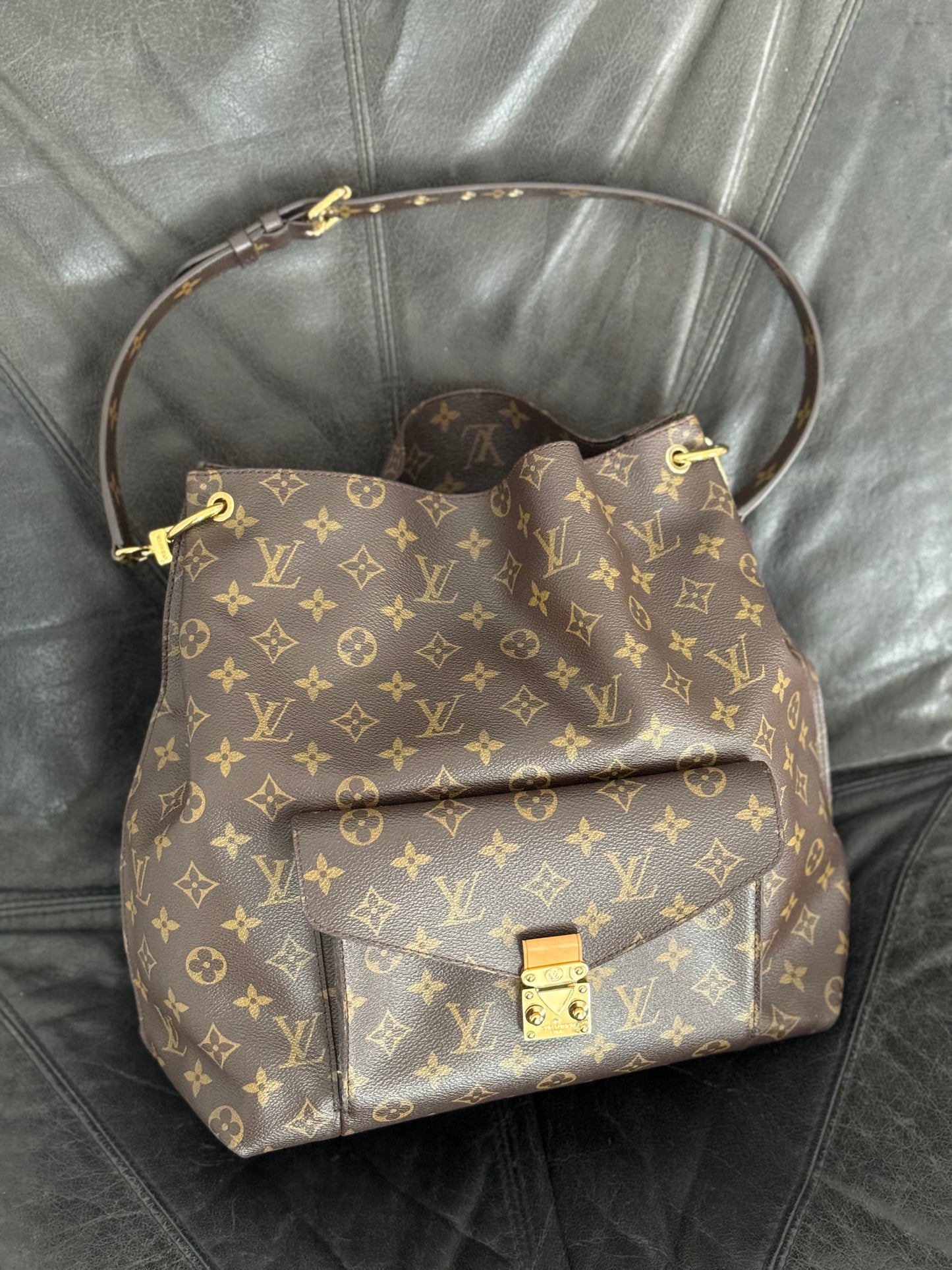 Louis Vuitton Metis hobo.
Monogram