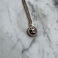Collana con bottone Chanel