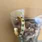 Bracciale rigido vintage con pietre verdi
