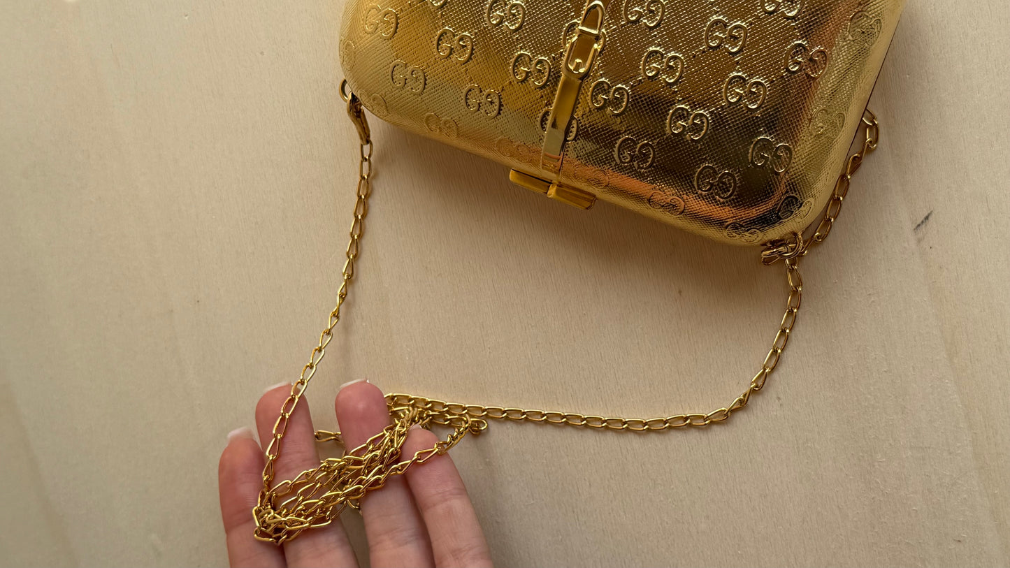 Gucci Vintage GG
Monogram Gold Minaudière
Clutch | Gold Hardware