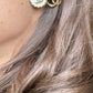 Orecchini con bottone Chanel