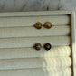 Orecchini con bottone Chanel