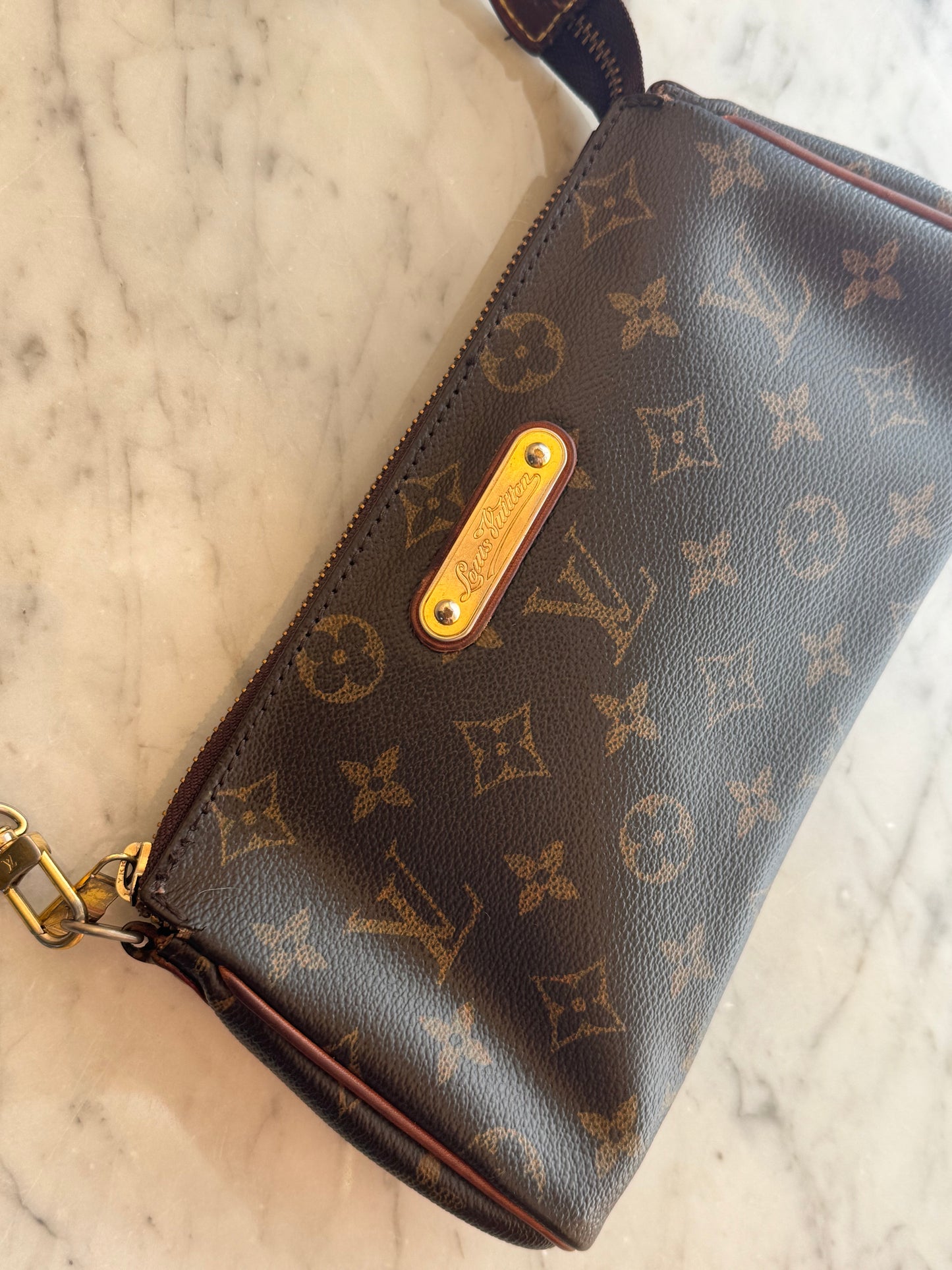 Pochette Eva Louis Vuitton