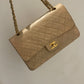 Chanel media in agnello beige.
Misura 25 cm