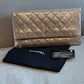 Timeless Chanel Pochette gold rose.