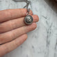 Collana con bottone Chanel