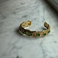 Bracciale rigido vintage con pietre verdi