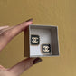 Orecchini Con bottone Chanel
