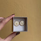 Orecchini con bottone Chanel